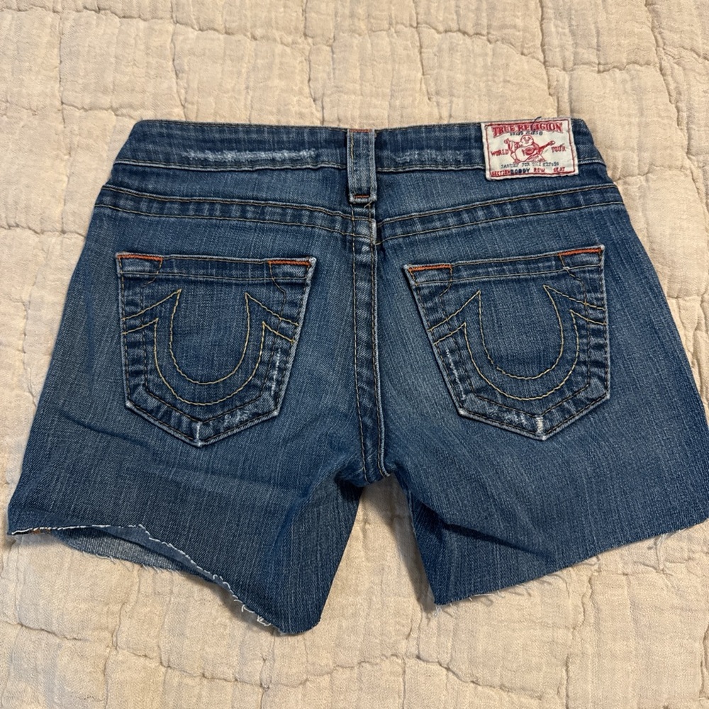 True Religion Blue Jean Shorts with Raw Hem size 26